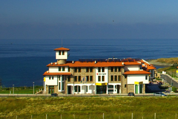 South east view from terrace of Villa Duo, water sports centre complex, does not block the sea view.