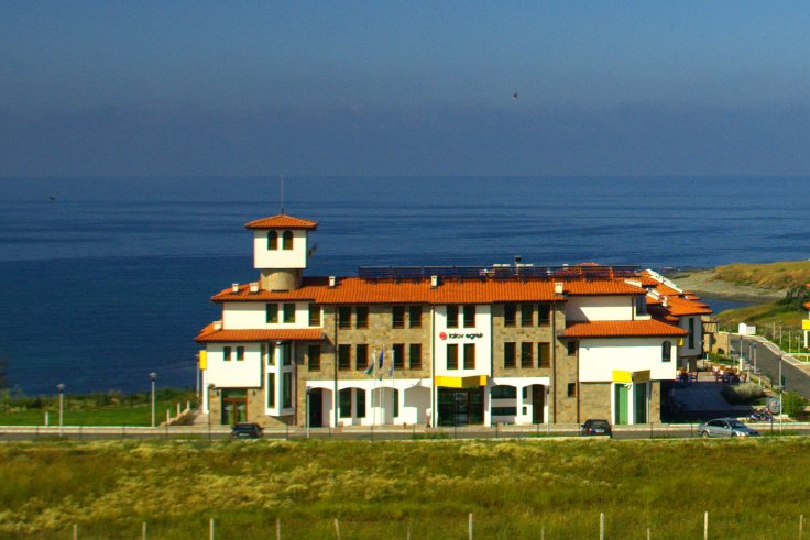 South east view from terrace of Villa Duo, water sports centre complex, does not block the sea view.